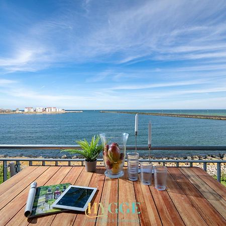 Hygge Lodge 18 Meerblick Am Strand أوبلينتيز المظهر الخارجي الصورة